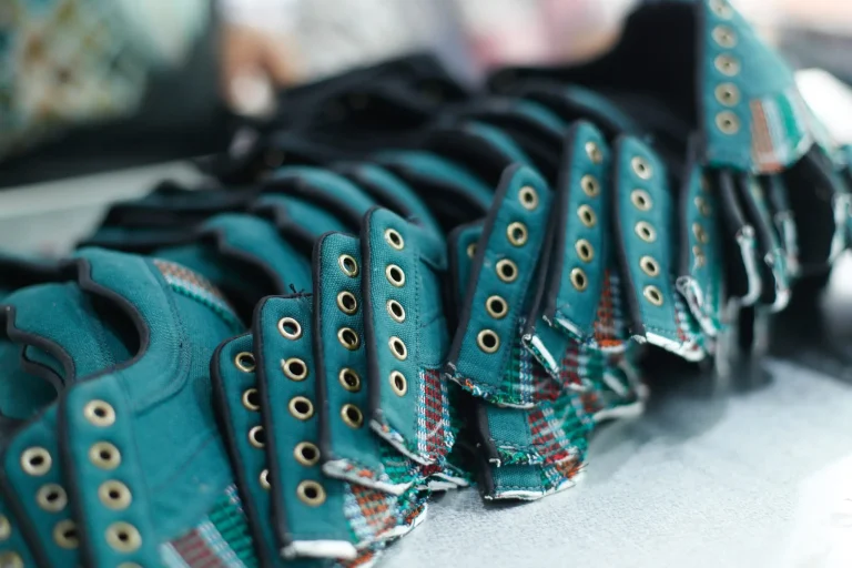 teal colored shoe upper of Dochaa